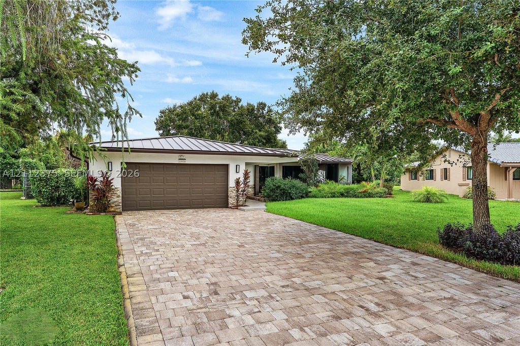 Photo of 10936 NW 41st Dr, Coral Springs, FL 33065 (MLS # A12112375)