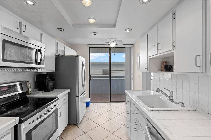 Located in the secluded ParkView Island, off 73 street in Miami Beah. Featuring 2 ample bedrooms and 2 full baths, lots of windows to allow natural light to come in. Access the xtended balcony from the living room, kitchen or bedroos. Comes with 1 assigned parking space and laundry on each floor for your convenience Gym and pool. A few blocks from the beach, restaurants, cafes, stores & Bandshell. Easy access to public & free transportation.