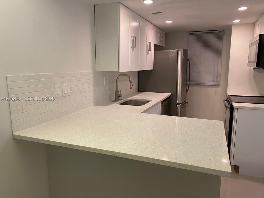 Photo of 3248 Coral Ridge Dr #3248, Coral Springs, FL 33065 (MLS # A12002684)