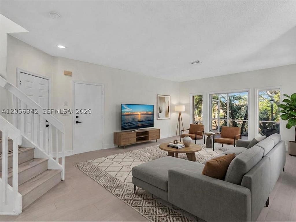 Photo of 11407 Lakeview Dr, Coral Springs, FL 33071 (MLS # A12056342)