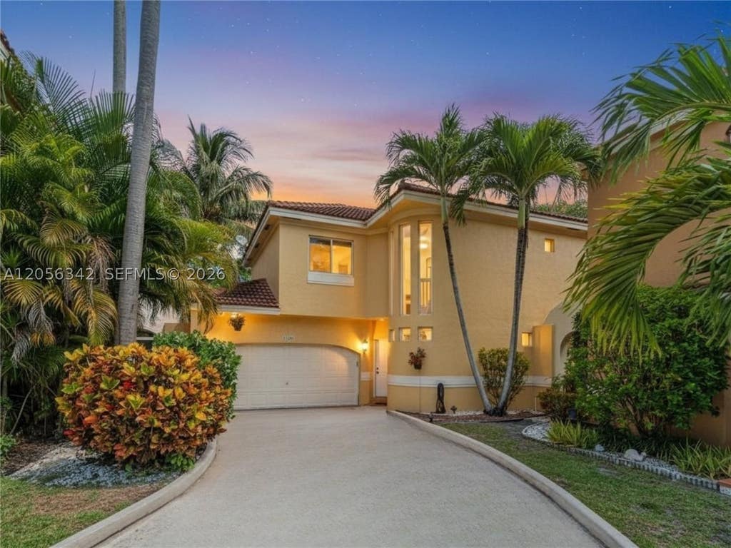 Photo of 11407 Lakeview Dr, Coral Springs, FL 33071 (MLS # A12056342)