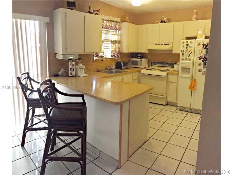 Spacious and lovely 2 story townhouse centrally located across the street from FIU. Close to major highways and Dolphin Mall. Master bedroom has a walk in closet and updated Bathroom. Features a perfect patio for entertaining and two assigned parking spaces.