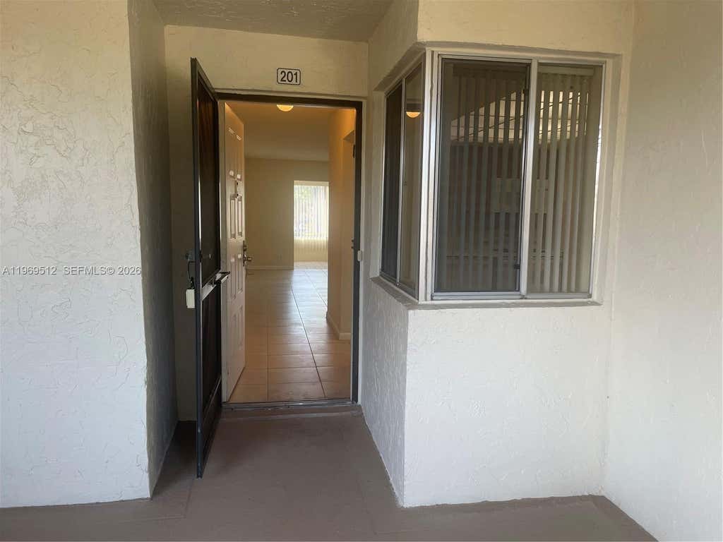 Photo of 3186 Via Poinciana #201, Lake Worth, FL 33467 (MLS # A11969512)