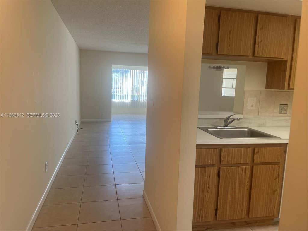 Photo of 3186 Via Poinciana #201, Lake Worth, FL 33467 (MLS # A11969512)