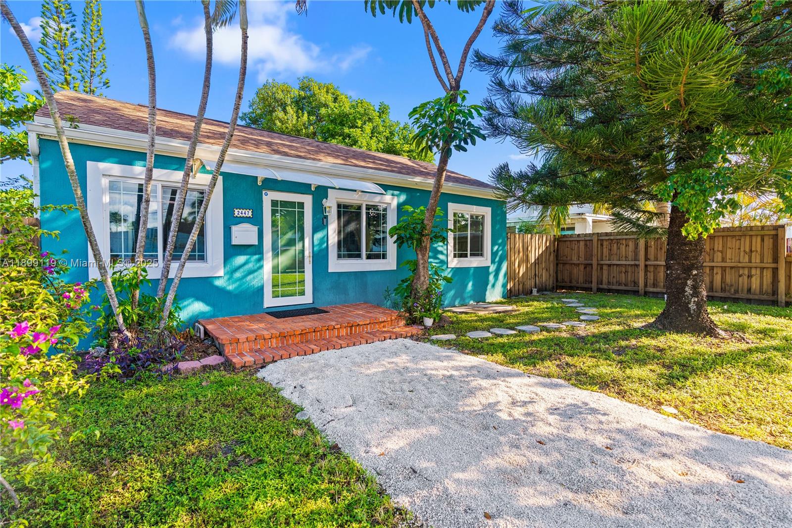 Oversized corner lot - bring your boat or RV. This home has many updates, including a NEW roof w/wind mitigation, NEW impact-resistant windows & doors, NEW electrical system, NEW septic tank & drainfield, and fresh stucco for a clean, contemporary look. Additional improvements feature updated bathrooms, a NEW gravel driveway, NEW perimeter fencing, and a monitored ADT alarm system for added security. The spacious and private backyard is perfect for entertaining, relaxing, or creating your own outdoor oasis. Located within close proximity to the award winning Hollywood Beach Broadwalk, Downtown Hollywood - known for its walkable streets, dining, and vibrant arts scene, and Dania Pointe - with great shops, restaurants, & entertainment. No HOA. FHA & VA welcomed.