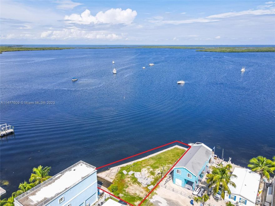 OWNER FINANCING IS POSSIBLE Incredible open water views are yours from this sought-after ready-to-build, ROGO EXEMPT lot facing OPEN WATER Tarpon Basin with* 160' FEET OF WATERFRONT and seawall dock. *ARMY CORP PERMITS ARE IN HAND! PLANS for a 3 bedroom 2.5 bath pool home will afford the owners a multi-million dollar home & view! Architectural plans are available for review from the listing agent, along with the permitted setback schematics showing the proposed structure. A house of approximately 3,000 square feet under air, w/ understory parking, storage, & outdoor entertainment areas. Key Largo Village offers 2 private homeowners' parks, white sand beaches, a party pavilion,& private underutilized boat ramp. 1hr to MiamiInternational & yet a tropical world away. This one is ready to go!