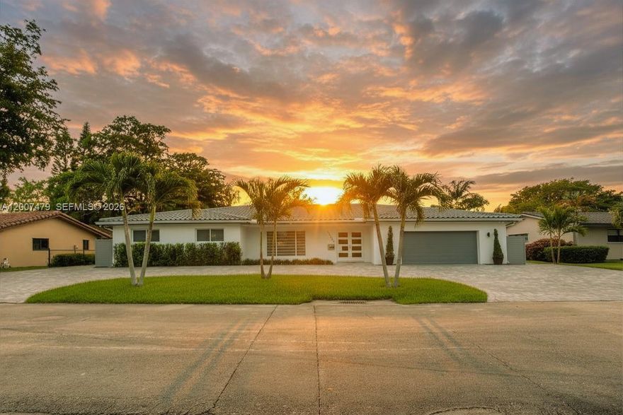 Exceptional remodeled single-family home located in the heart of the Country Club of Miami. This property features 4 bedrooms and 4 full bathrooms, with stylish 32x32 porcelain tile throughout. The home is fully equipped with impact windows, Bahamas blinds, and zebra shades for both security and style.

The oversized master bedroom is a particular highlight, featuring an exquisite attached sitting area that offers the versatility to be used as a nursery, home office, exercise room, or an expansive custom walk-in closet, making it a woman's dream closet space!. It also features another walk-in closet and remodeled bathroom with double sink, jacuzzi tub and standing shower. 

For those who enjoy entertaining, the kitchen includes modern cabinets with hydraulic dampers for soft close and a decorative backsplash. The spacious living room is filled with natural light and overlooks a screened pool and patio area, providing a serene view of the golf course. The patio includes a full kitchen with refrigerator, gas stove and barbeque, along with sink and separate terrazzo space for large patio furniture. The pool area connects to a full bathroom for easy access and convenience, This convenient set-up allows guests to use the restroom to change or shower without having to enter the main house. Six camera surveillance system around the property. 

The house has two AC units. Club membership required. Association approval required. Call listing agent for more information