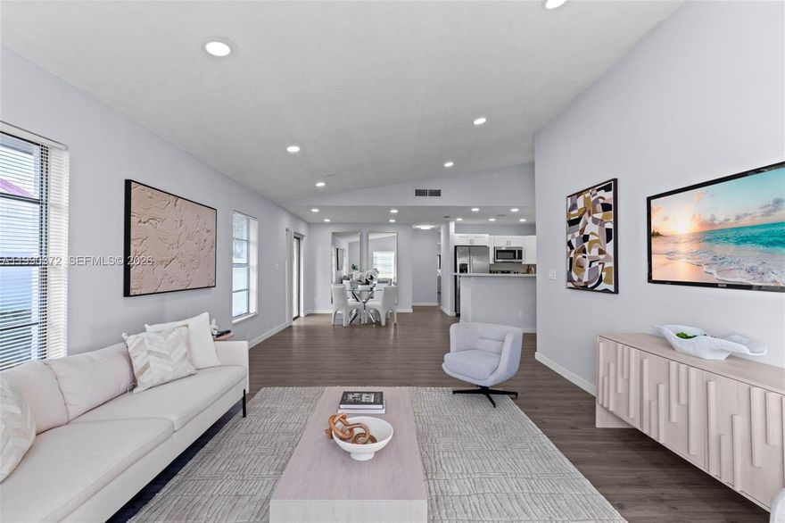 Welcome to this charming and well-maintained 2-bedroom, 2-bathroom townhome located in the highly desirable Wellington area. 

This home features a bright open-concept layout with a stylish bar-style kitchen, complete with stainless steel appliances—perfect for entertaining or everyday living.

Enjoy modern finishes throughout, including sleek gray waterproof vinyl plank flooring and freshly painted light gray walls that create a clean, inviting atmosphere. Both bathrooms have been tastefully updated, offering comfort and style.

Major upgrades include a new roof and A/C installed in 2023, providing peace of mind for years to come.

With NO HOA, this property offers maximum flexibility—ideal for homeowners, investors, or those looking to Airbnb or rent without restrictions.

Conveniently located within walking distance to the Wellington Town Center and municipal complex, you’ll be just minutes from shopping, dining, parks, and entertainment.

Don’t miss this opportunity to own a move-in-ready home in one of Wellington’s most sought-after locations!