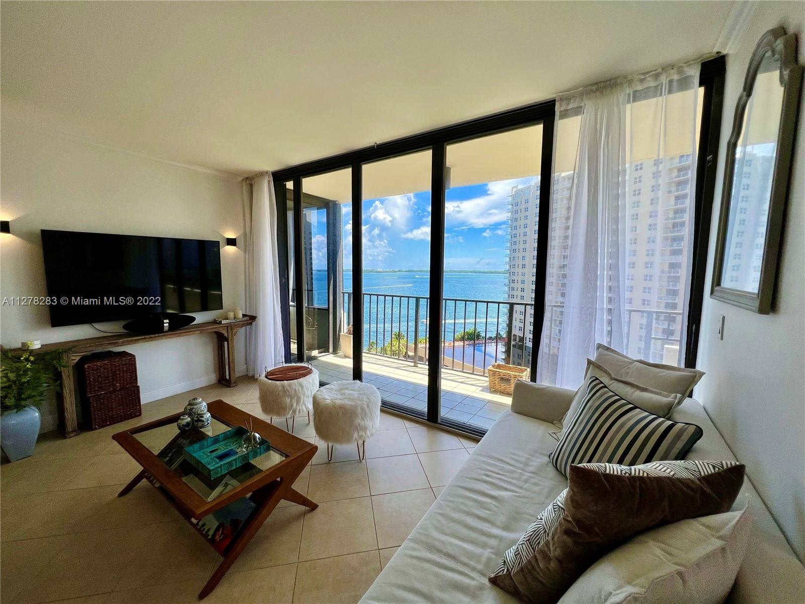 * Fully furnished move in ready 6 or 12 month rental available now * Brickell Key waterfront w/ stunning panoramic bay skyline water views from all rooms * desired entire SE corner "15" line w/ wide wrap around balcony & huge open floor plan w/2 spacious bedrooms + bonus den/office + 2.5 baths! updated 1,375+ sf end unit w/breathtaking floor to ceiling windows natural light & split plan provides great privacy w/lots of storage incl. walk in organized closets thruout! ss appliances, lg washer/dryer & 1 parking space. amenities incl.: free guest valet parking, pool, gym, ~2km waterfront jogging path, tennis, racketball & basketball courts, kids park * available fully furnished only * no pets * modern furniture, tv's, fully stocked kitchen/baths * rarely available & never previously rented *