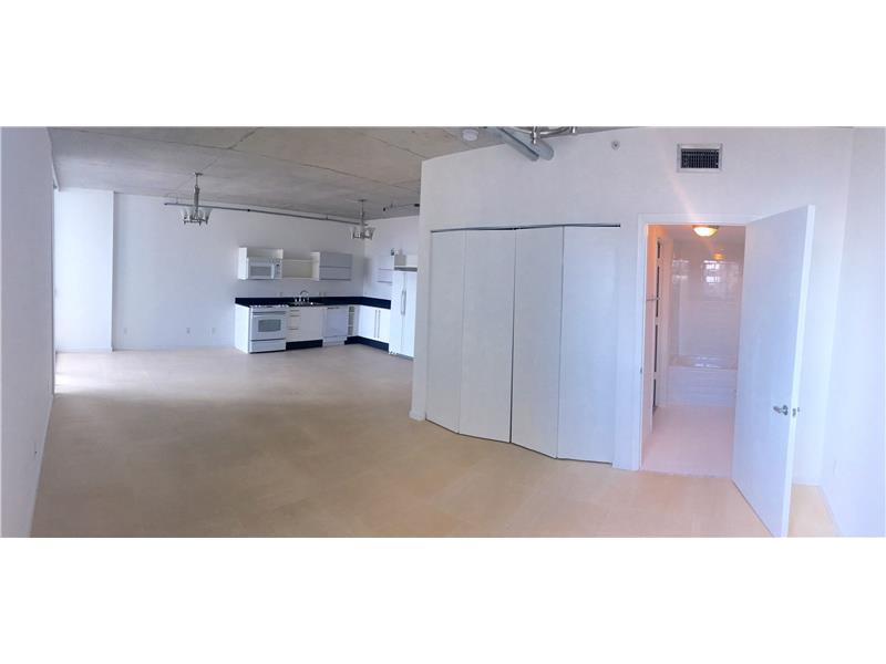 Open Loft in Neovertika. Marble floors throughout, washer/dryer, 1 assigned pkg. Unit has been freshly painted and ready to move in. Building features: security, valet, large pool, spa, gym, activities room and more. High floor with city views. Walk to w ork, stores, restaurants, metrorail station, etc. Just steps from "City Center". No pets allowed per condo rules. Proof of employment and credit report to be submitted with all offers.Aditional security required by Association