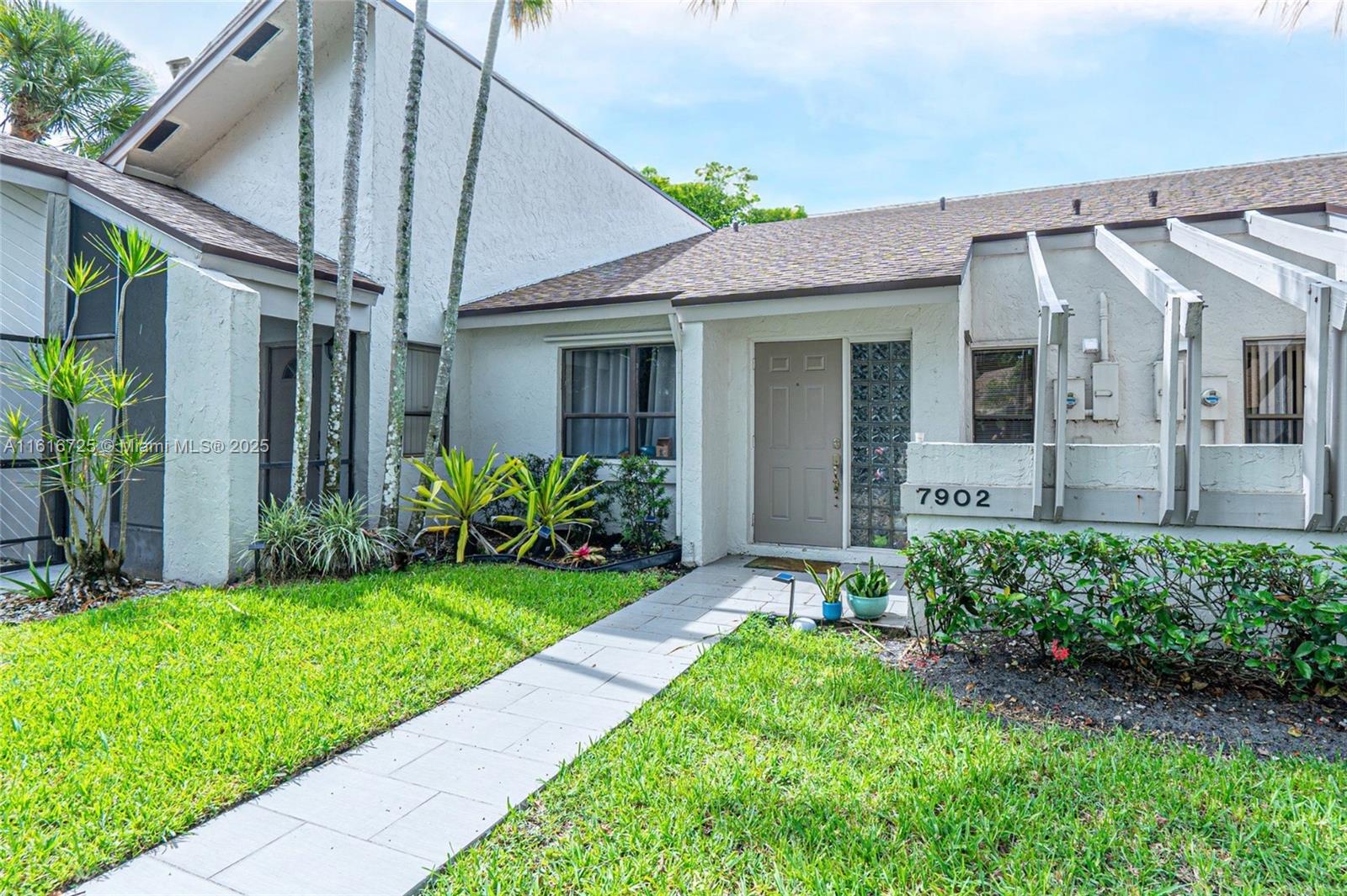 ** YOU'LL FALL IN LOVE WITH THIS STUNNING 2BR Villa Plus Bonus Room in the Heart of Jacaranda!! Offering volume ceilings the moment you enter with an open, bright, and spacious floorplan with gorgeous modern finishes throughout and a BRAND NEW ROOF in 2023! You'll fall in love with the spacious kitchen featuring beautiful wood cabinetry, quartz countertops, and stainless appliances. Relax on the large screened-in porch overlooking the sunset and water views. Two assigned parking spaces, guest parking, and low maintenance fees of $210 covering landscaping and common area. Pet-friendly community. Close to everything... endless fine dining & shopping, The NEW Plantation Walk Plaza, schools, parks, and all major highways. The perfect place to call home!