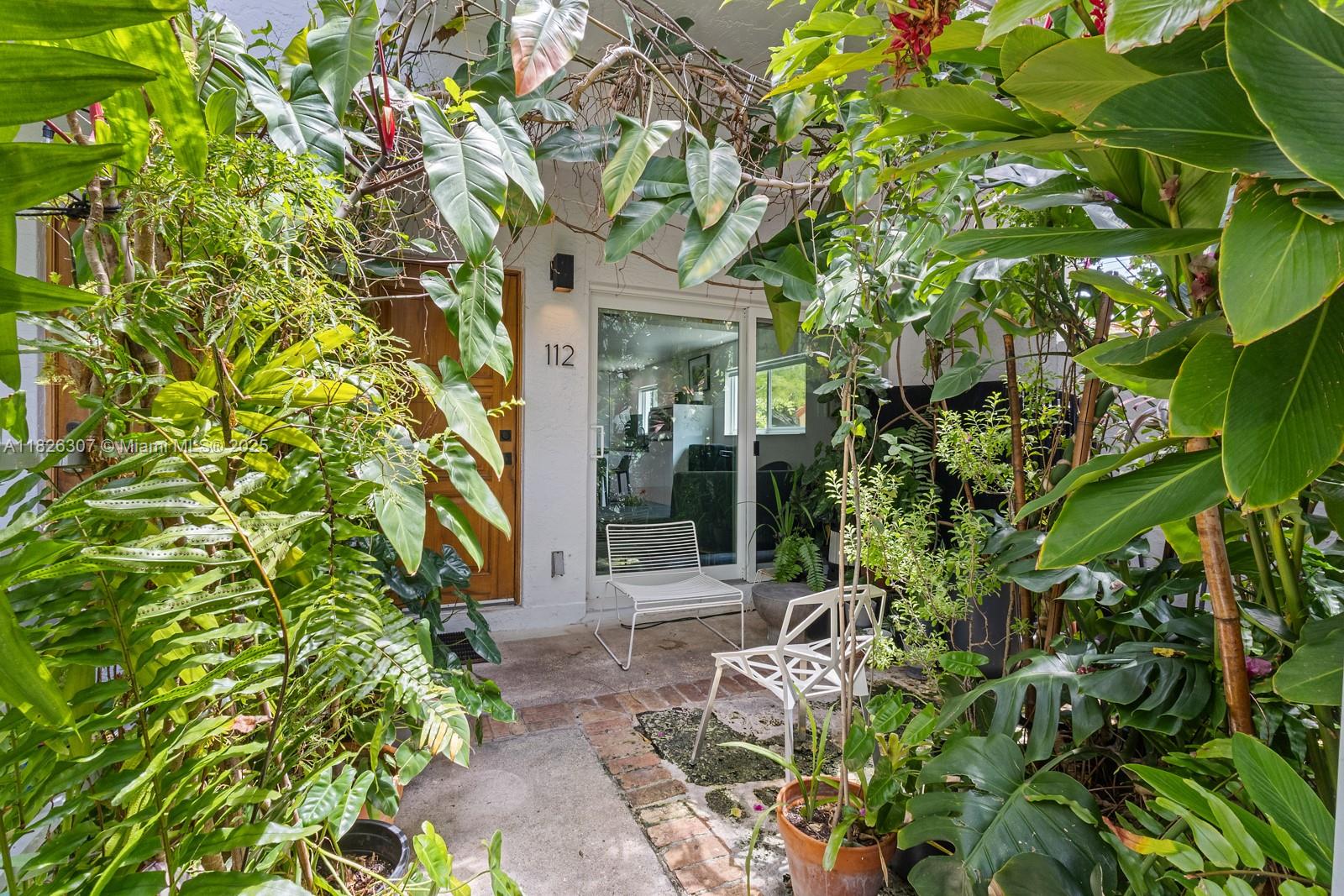 STUNNING CORNER TOWNHOUSE IN THE HEART OF SOUTH OF FIFTH! THIS IS THE FULL 2-CAR COVERED GARAGE (300 SF) YOU’VE BEEN DREAMING OF—INCREDIBLY HARD TO FIND IN THIS AREA, PLUS A 2-CAR DRIVEWAY TO PARK UP TO 4 CARS! THIS 3-BEDROOM, 2-BATH HOME FACES SOUTHWEST, BRINGING IN NATURAL LIGHT AND SKYLINE VIEWS. ENJOY SLEEK CONCRETE, CERAMIC, AND WOOD FLOORS, A CUSTOM GLASS-ENCLOSED MASTER CLOSET, HIGH CEILINGS, AND IMPACT WINDOWS AND DOORS. ALL BEDROOMS HAVE BALCONIES, AND THE ENTRY PATIO IS LUSH AND LANDSCAPED. THE KITCHEN FEATURES HIGH-END APPLIANCES INCLUDING MIELE, GAGGENAU, AND THERMADOR, WITH AN INDUCTION COOKTOP. LOCATED JUST MINUTES FROM THE BEACH, FINE DINING, AND NIGHTLIFE. ONLY 16 UNITS IN THE ASSOCIATION—PRIVATE AND FULL OF MIAMI BEACH LIFESTYLE.
