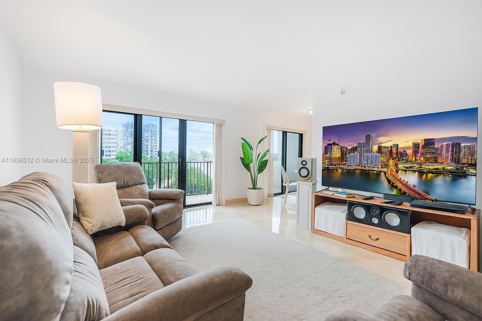 Spacious 2BR/2BA condo with 1,560 sq. ft., located on the 4th floor at The Summit, right at the entrance of Hollywood’s famous Broadwalk. This bright south-facing unit offers abundant natural light, a split floor plan with two en-suite bedrooms, updated kitchen with hickory wood cabinets, quartzite countertops, and new electrical panel. Features include marble flooring, smooth ceilings (no popcorn), impact windows/doors, and LED lighting. Enjoy Intracoastal and partial ocean views from the large covered balcony. Includes deeded garage parking and in-unit washer/dryer. The Summit offers 24-hour security, 2 heated pools, oceanfront restaurant, gym, tennis, pickleball, and more. Minutes to FLL Airport, shops, dining, and downtown Hollywood.