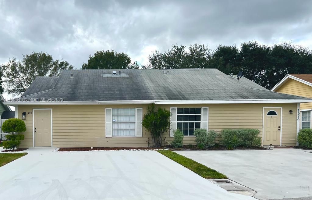 Photo of 1522 Royal Forest Ct, Palm Springs, FL 33406 (MLS # A11480843)