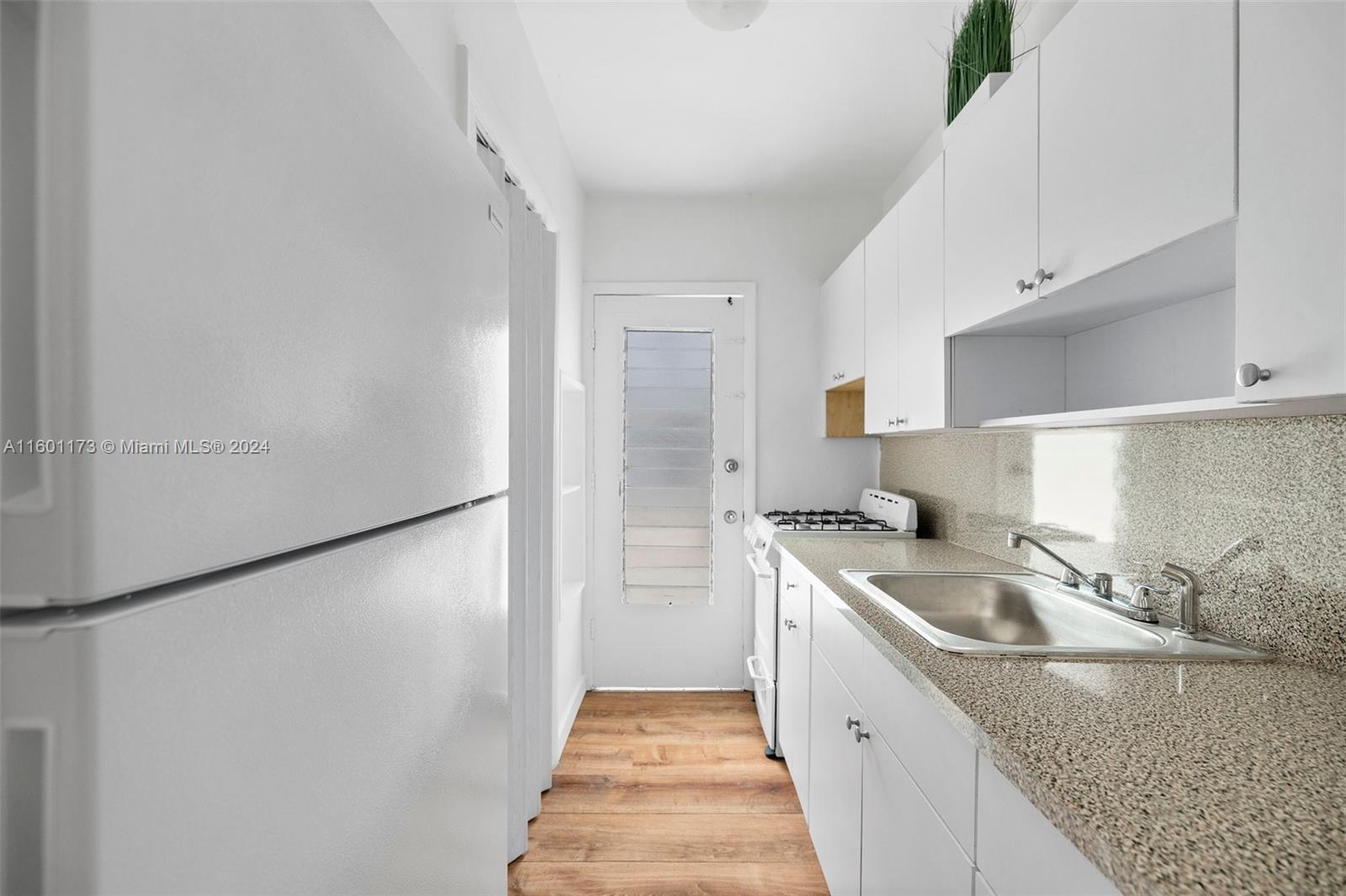 Spacious 1 bedroom, 1 bathroom apartment completely remodeled in the heart of North Beach. Come in and enjoy the open and updated kitchen, custom cabinetry, custom countertop, stainless steel appliances and updated full bathroom with bath tub. Apartment bedroom also very spacious and offers his and her closet. Rent includes 1 assigned parking and water. Building includes a washer/dryer area and lush landscapes. Minutes away from the beach, Publix, Normandy Isles, & Parkview Island Park.