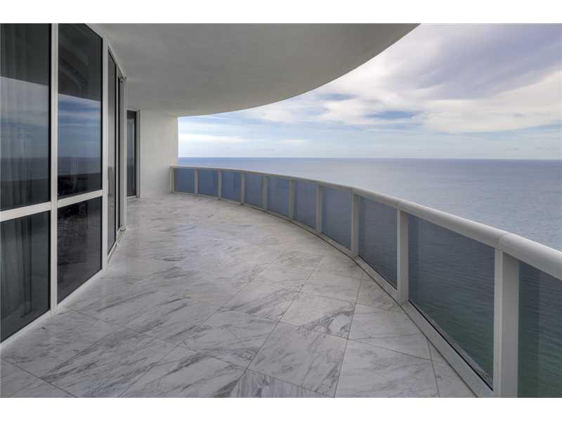 A truly RARE opportunity in Trump Royale, this turnkey designer-decorated penthouse has panoramic ocean views from every room, high ceilings, completely remodeled and custom lighting throughout. ONE-OF-A-KIND OPPORTUNITY TO BUY INCLUDING A PRIVATE BEACHFR ONT CABANA & 1 DEEDED PARKING SPOT! Easy to show. A must see for you and your clients.