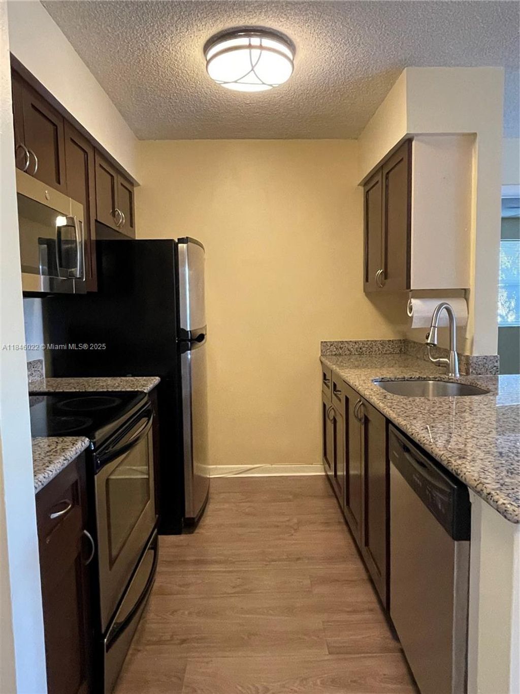 Photo of 10428 NW 8th St #204, Pembroke Pines, FL 33026 (MLS # A11846022)