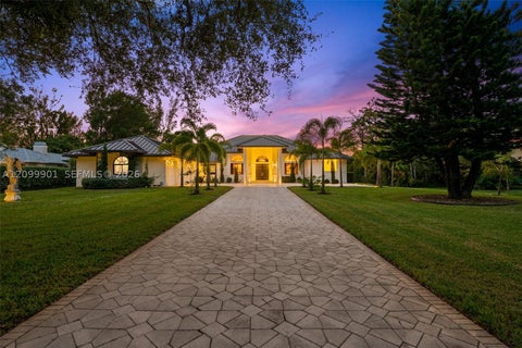Photo of 6775 NW 65th Terrace, Parkland, FL 33067 (MLS # A12099901)