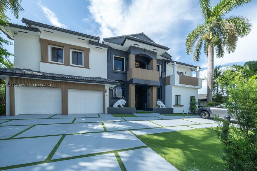 Spectacular waterfront home in the prestigious Eastern Shores neighborhood. This 6bed/4.5 bath 2-story home features 80 ft. of water frontage, with direct ocean front access. Features include a beautiful modern kitchen with high end appliances, marble and wood floors, movie theater room w/ 9 recliners, wine cellar, and a huge master suite with an office/sitting room with large tub/spa, separate shower. Fantastic outdoor entertaining area with a pool/spa patio with a covered BBQ area.  Located within a short distance to Sunny Isles Beach, Oleta Park, and plenty of shops and restaurants.