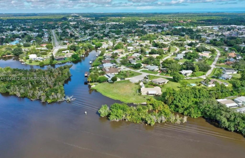 Photo of 305 SE Camino Ct, Port St Lucie, FL 34952 (MLS # A11945472)