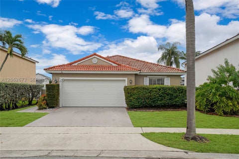 Photo of 18946 NW 10th St, Pembroke Pines, FL 33029 (MLS # A12062672)