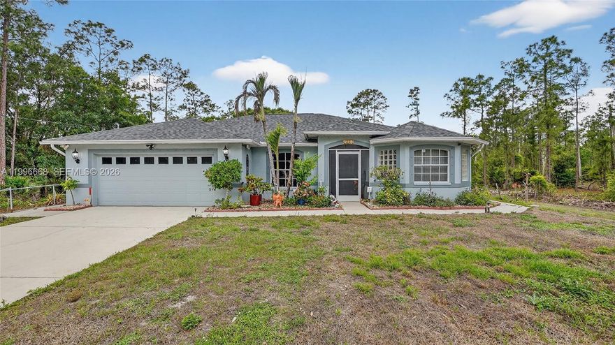 Beautifully maintained 3-bedroom, 2-bathroom home situated on a spacious half-acre lot, surrounded by lush
landscaping in a quiet and desirable neighborhood. This charming residence features a new roof and air
conditioning, offering peace of mind and modern comfort. Enjoy outdoor living at its finest with a heated pool,
covered patio, and screened-in area—perfect for relaxing or entertaining. The home is equipped with shutters
for all openings and is wired for automatic lighting in the event of a power outage. Also, it has additional Air
condition for the Garage. Driveway can fit up to Six Cars.
An exceptional added opportunity: the adjacent half-acre lot is also available for purchase for only $30,000
allowing the future owner to own a full acre of land. Whether you envision building an additional home,
expanding the existing residence, or creating a custom estate, the possibilities are truly endless. Owners prefer to sell both properties together.