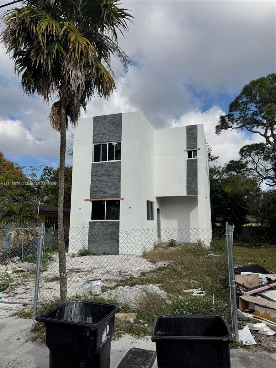 UNFINISHED. The owner is not finishing the build. Bring your vision and complete this new construction in the heart of Fort Lauderdale. The property is being offered as-is, presenting a rare chance for investors or builders to step in and add value. The home was designed with modern luxury in mind--featuring a spacious open-concept layout, a gourmet-style kitchen setup, and a second-floor layout with three bedrooms and a balcony. A recently closed comp next door sold for $520,000. Don't miss this equity-building opportunity in a rapidly evolving neighborhood. All measurements should be verified by buyer and or their representative.