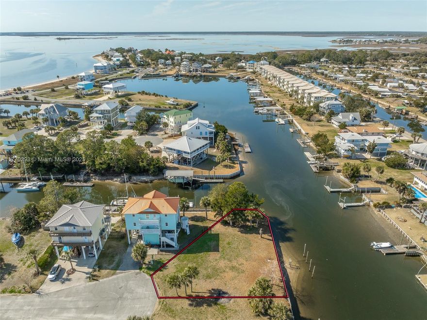 End of the cul-de-sac waterfront buildable lot right on Sandy Lane! This amazing lot boasts close to a 1/4 acre of buildable land! This property has over 100 feet of water right on the canal. Great for boats, jet skis, wave runners Kayaks and much much more!