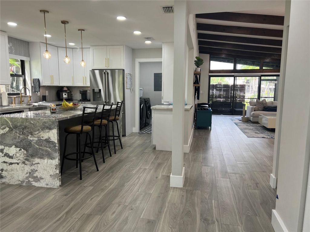 Photo of 958 Mockingbird Ln #508, Plantation, FL 33324 (MLS # A11604042)