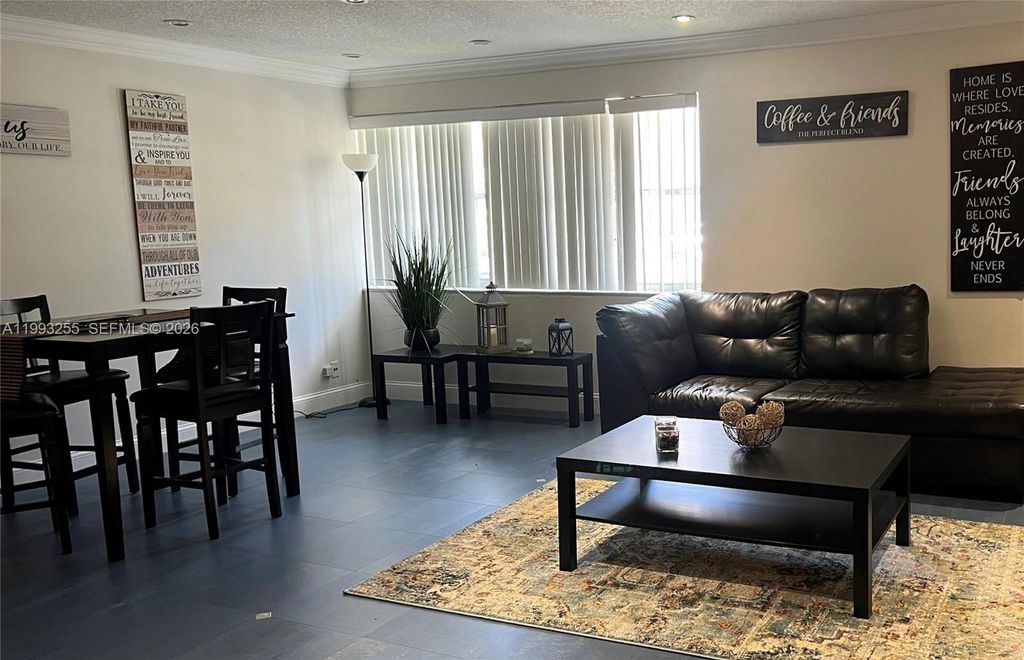 Photo of 401 Golden Isles Dr #101, Hallandale Beach, FL 33009 (MLS # A11993255)