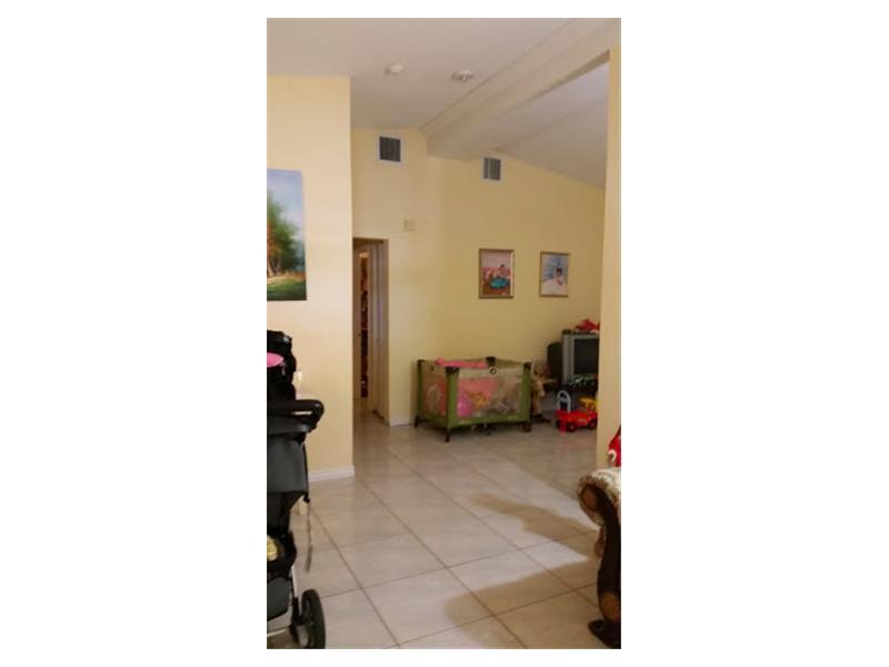 Great home for 2 families. In-law's quarters has separate entry with full living facilities. Property is zoned duplex and many duplexes in the area. Property size is .45 of an acre!!!