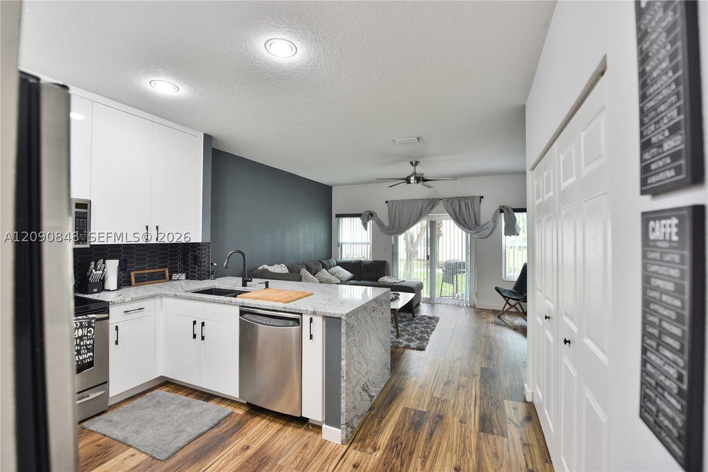 Photo of 3356 NW 29th Ct, Lauderdale Lakes, FL 33311 (MLS # A12090848)