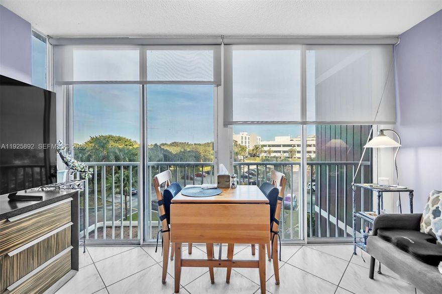 Calm and comfortable lifestyle in this updated 1 bedroom, 1 bath condo, tucked inside one of Hollywood’s most peaceful communities. The layout feels open and inviting, with a bright living area that flows into an enclosed balcony perfect for a small office, hobby room or simply a quiet spot to enjoy your morning coffee. The unit has been refreshed with clean finishes, ample closet space and a practical kitchen that makes everyday living easy. If you want a turnkey move, the furniture can stay, giving you an immediate home without the hassle of furnishing. The building is well kept and offers the kind of amenities that make life feel effortless: a heated pool for relaxed afternoons, scenic walking paths, a community room with BBQ areas, extra storage, plenty of guest parking and a friendly atmosphere that residents genuinely appreciate. The location is one of the highlights, placing you close to shopping, restaurants, beaches, hospitals, golf, the Hard Rock, Gulfstream Park and major highways for stress-free commuting. Whether you’re downsizing, looking for a second home or wanting a quiet place that still keeps you close to everything Hollywood offers, this 55+ condo delivers comfort, convenience and a warm community feel from the moment you walk in