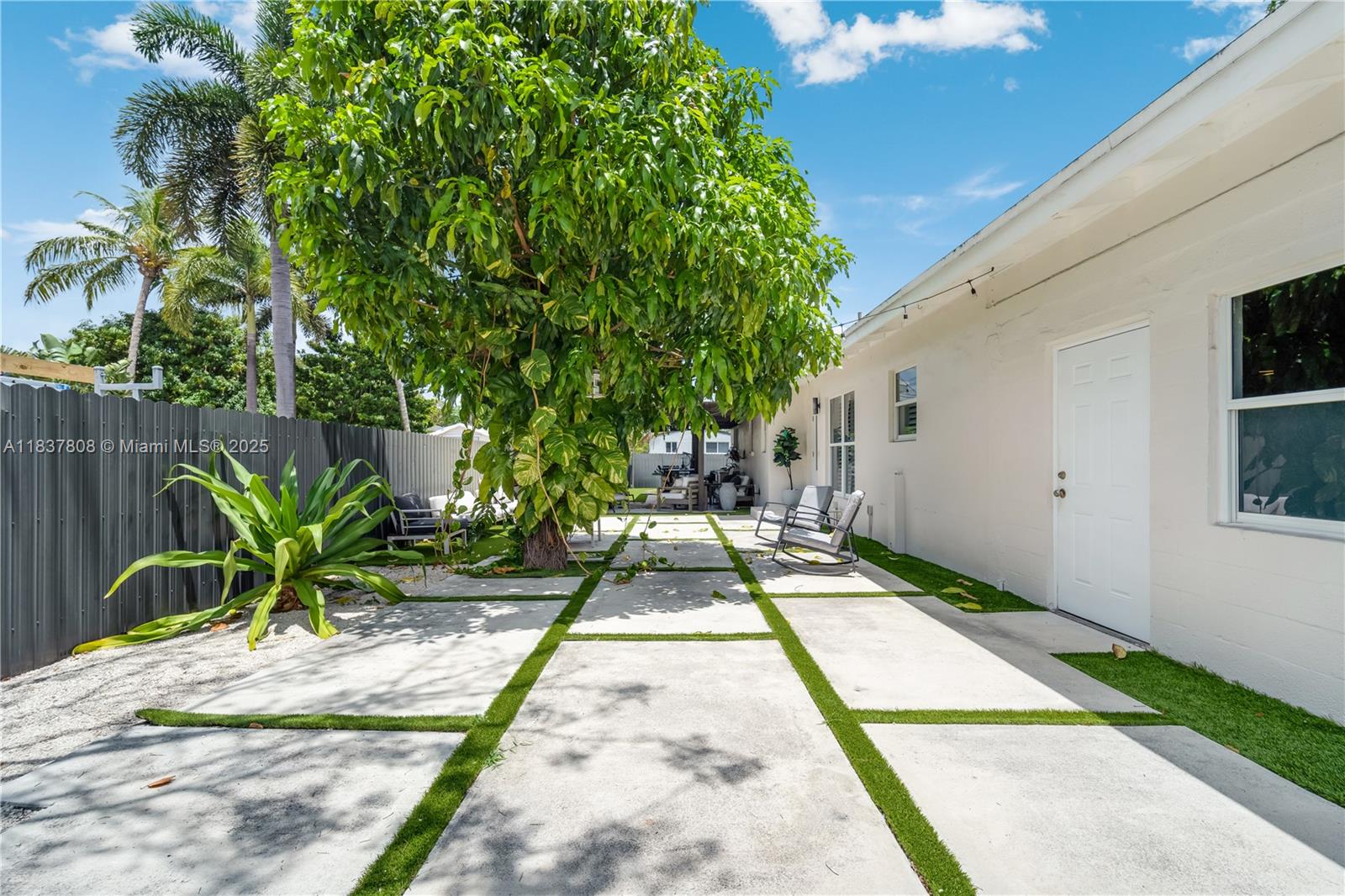 One of a kind, beautiful well maintain home done up to perfection in a well stablished neighborhood with close proximity to the beach, shops, restaurants and all the Miami action. Nestled in a very pedestrian neighborhood with quiet streets and mature tress. Roof is almost new, with impact windows, tastefully remodel with brand new kitchens and bathrooms, top of the line appliances and high end material. Home is very bright with a modern look, everlasting polished terrazzo floors and tons of space in the backyard in order to entertain friends and families. Fully fenced with mature fruit trees and lots of space to park your cars and toys. Additional room that can be turn into an office, playground or man cave depending on your priorities. Come see for your self it won't last long on market