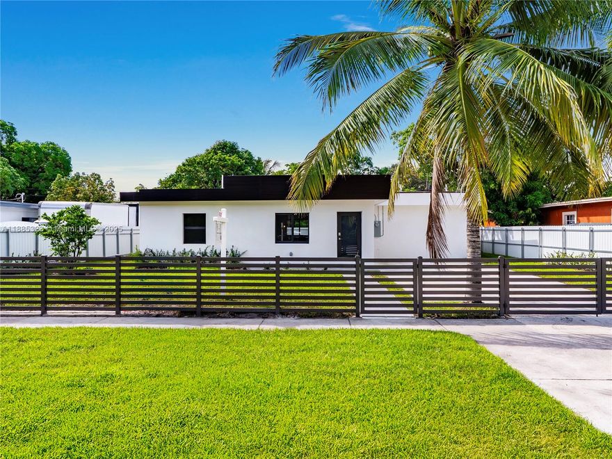 Welcome to this stunning home, fully renovated in 2025 with a thoughtfully designed addition and all major upgrades already completed. Enjoy peace of mind with brand new electrical wiring, plumbing, roof, and central A/C, ensuring modern comfort and efficiency throughout. The interior showcases timeless travertine porcelain tile flooring, adding elegance and durability to every space. A custom kitchen features premium KitchenAid appliances, sleek cabinetry, and a layout perfect for both cooking and entertaining. Outside, the property is fully fenced for privacy, highlighted by a beautiful modern gate with dual car entrances on either side of the home, offering convenience and curb appeal. A true turnkey residence blending style, quality, and functionality.
