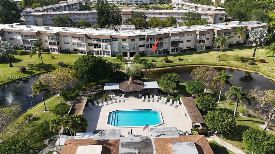 There is no minimum down payment requirement with this association, and it qualifies for financing.  Very clean and lovingly cared-for condo on the first floor of a quiet, predominantly seasonal 55+ community.  Just bring your suitcase! This unit is fully stocked and move-in ready.  This one-bedroom condo features an extra room of what is on the tax roll as an "office space," a room with windows overlooking the lagoon.  The unit is conveniently about 20 steps from the laundry room and mailboxes. Your assigned parking space is just in front of the unit.  Plenty of visitor parking adjacent. Enjoy blooming hibiscus trees and picturesque walkway bridges that lead to the heated pool.  Low maintenance fee covers water and cable.  Call for private tour.