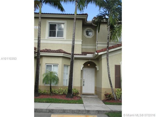 Beautiful two story townhouse at the Leeward sub division of The Islands at Doral Community. Features tile flooring on the first floor and Laminated floors throughout the second floor. This immaculate and spacious unit is very bright with open floor plan. Private fenced patio ideal for entertaining & BBQ. Amenities includes clubhouse, private events room facilities.