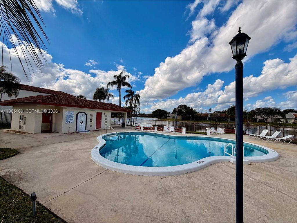 Photo of 1086 N Hiatus Rd #1086, Pembroke Pines, FL 33026 (MLS # A11965109)