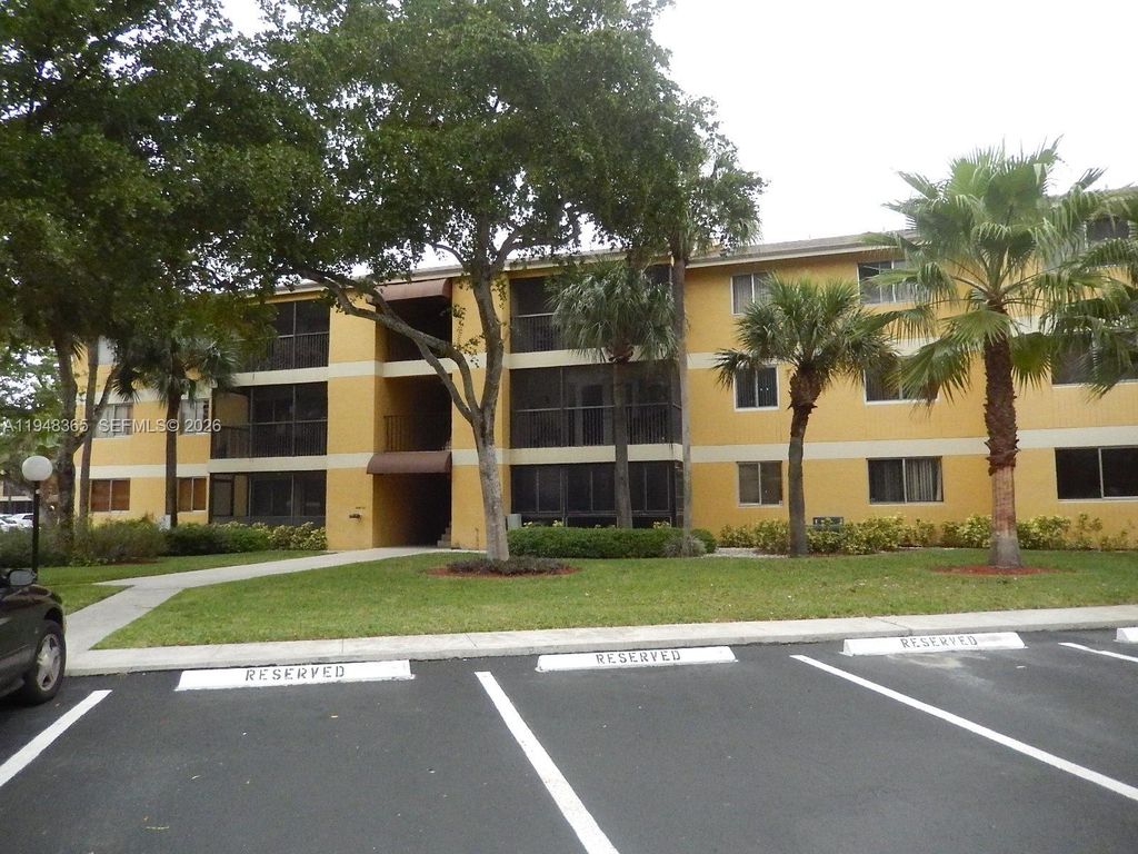 Photo of 3017 N Oakland Forest Dr #106, Oakland Park, FL 33309 (MLS # A11948365)