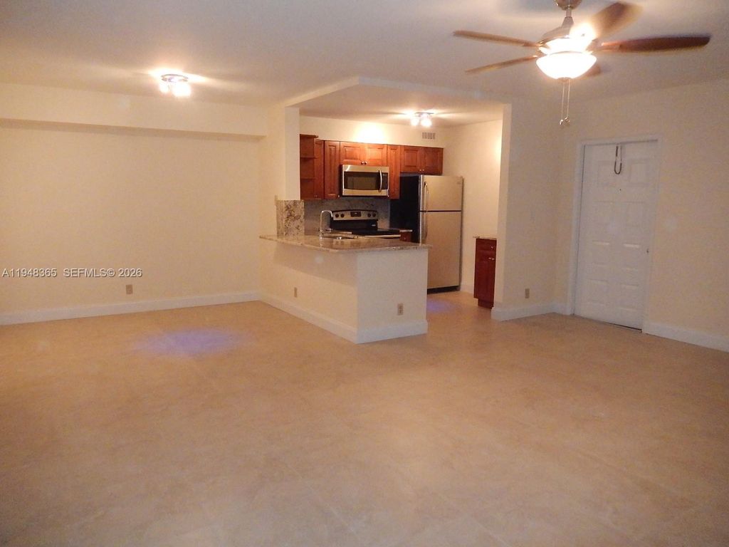 Photo of 3017 N Oakland Forest Dr #106, Oakland Park, FL 33309 (MLS # A11948365)