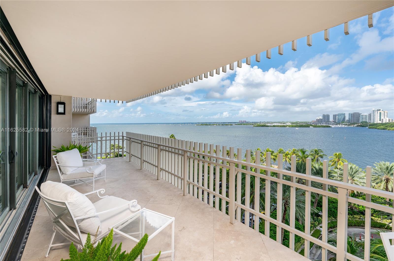 Grove Isle is a waterfront community located minutes from vibrant Coconut Grove and Brickell Ave. This updated corner flat boasts unobstructed water and sunset views .
A formal foyer leads to a grand living room with spectacular views of the Grove/Gables skylines. A large wrap around balcony allows for outdoor entertaining. A formal dining room is serviced by a
Chefs kitchen complete with top of the line appliances and custom cabinetry.
This 3 bedroom 3 bath residence is finished with beautiful details, including new white marble bathrooms, custom lighting and fixtures. Large closets , new air conditioning system, impact glass, electric shades allow for comfortable living. Grove Isle offers 24 hour security, multiple pools, tennis courts, walking path and marina.