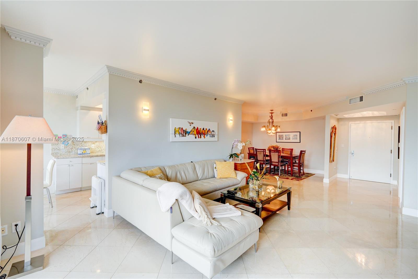 BEAUTIFUL UNIT IN LUXURIOUS 2000 BUILDING AT WILLIAMS ISLAND! 2 BEDROOM SPLIT FLOOR PLAN, LIGHT AND BRIGHT, FEATURING MARBLE FLOORS IN THE LIVING AREAS AND WOOD FLOORS IN THE BEDROOMS, CROWN MOLDING, UPGRADED DOORS THROUGHOUT, GRANITE KITCHEN COUNTERS, STAINLESS STEEL APPLIANCES, LARGE WALK IN CLOSET, WASHER/DRYER IN UNIT AND LARGE TERRACE ACCESSIBLE FROM EVERY ROOM! BUILDING AMENITIES INCLUDE PRIVATE GYM, MOVIE THEATER, GAME ROOM, SOCIAL ROOMS AND DAILY COFFEE SERVICE. LIVE IN PRESTIGIOUS WILLIAMS ISLAND WITH FULL AMENITIES: 15 TENNIS COURTS, 4 PICKLE BALL COURTS, 3 RESTAURANTS, STATE OF THE ART SPA, MARINA, WALK/JOG PATH, KIDS PLAYGROUND, COURTESY BUS, WALK TO HOUSES OF WORSHIP AND SO MUCH MORE....