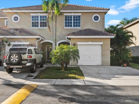 Photo of 12170 SW 5th Ct, Pembroke Pines, FL 33025 (MLS # A12045635)