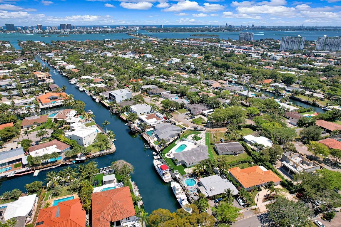 Stunning canal front property in Keystone Islands.
Welcome to the epitome of beachfront luxury! Located within the Keystone community, this exceptional property offers an unparalleled lifestyle. Located across from the serene canal, this home offers direct access to the stunning Miami Bay; The 100 feet of water frontage attracts yacht enthusiasts and water lovers alike.
Imagine waking up to the gentle lapping of water against your private dock. Spanning nearly 10,000 square feet, the lot ensures ample space for outdoor enjoyment, a large pool, entertaining, and potential expansions. Security and exclusivity define the Keystone Islands. Enjoy the tranquility in this prestigious enclave. This gem awaits its new owner: a visionary who appreciates the good things in life.