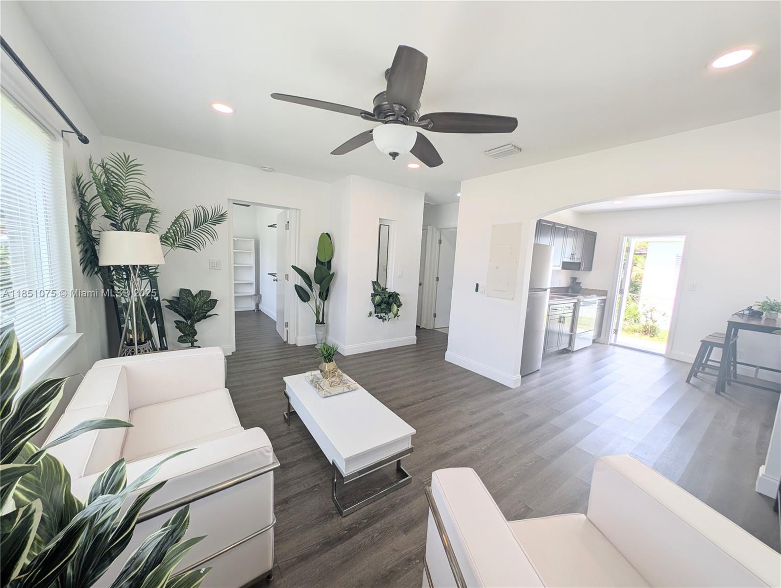 This charming 2 bedrooms home is located just few minutes to Young Circle, shops and restaurants, fast access to I-95 and only 8 min to the beautiful Hollywood with it's boardwalk and entertainment. Fully upgraded : impact windows, laminate floors, open kitchen, new fridge, large closets, modern bath, central AC, freshly painted, 2 entrances make this easy to share. Partially furnished or unfurnished is an option too. Free laundry room attached, water and lawn maintenance are included. Enclosed ,concrete patio is great for your enjoyment and pets. Plenty of parking space, available right away, fast approval, easy to see.