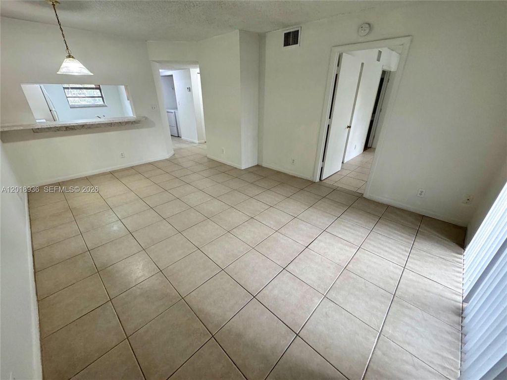 Photo of 3500 NW 116th Ter #3500, Coral Springs, FL 33065 (MLS # A12018936)