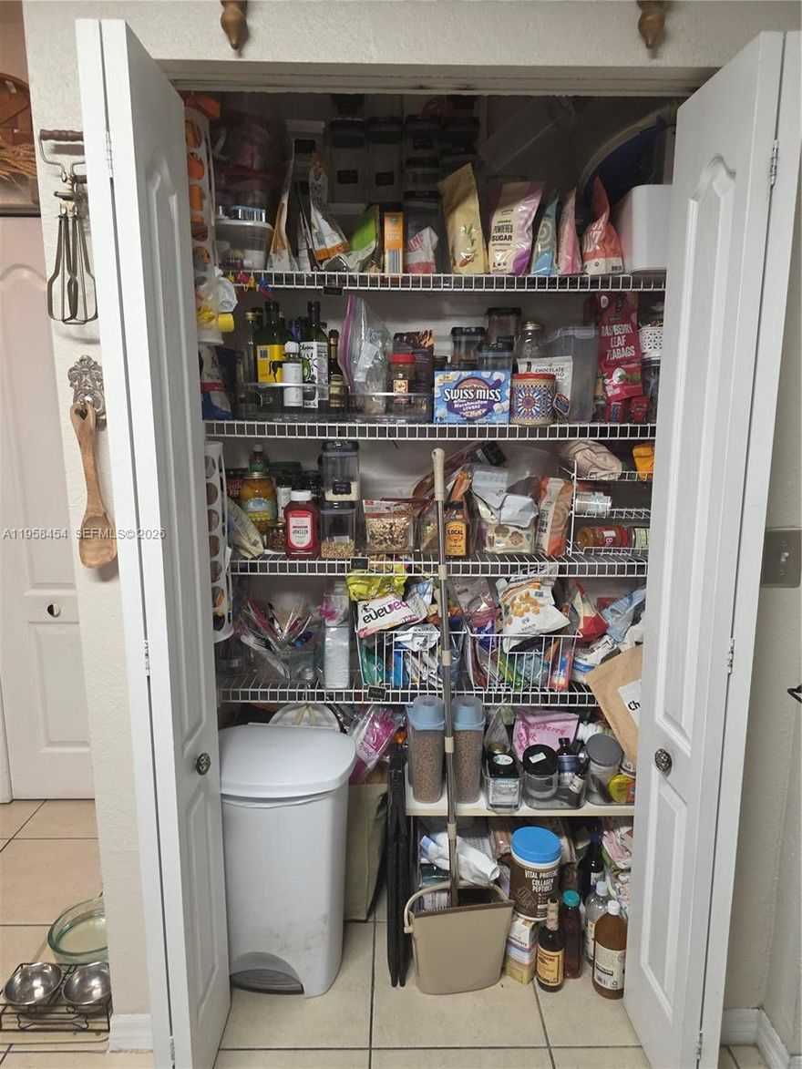 ONE OF A KIND TOWNHOME IN THE HEART OF HIALEAH GARDENS, GATED COMMUNITY-2BED/2.5BATH +DEN/OFFICE. SPACIOUS PATIO WITH STORAGE ROOM.LAUNDRY ROOM WITH FULL WASHER/DRYER. MASTERBEDROOM WITH BALCONY.LARGE ATTIC. 2 ASSIGNED PARKINGS. GREAT FOR A FAMILY OR INVESTOR. A MUST SEE.