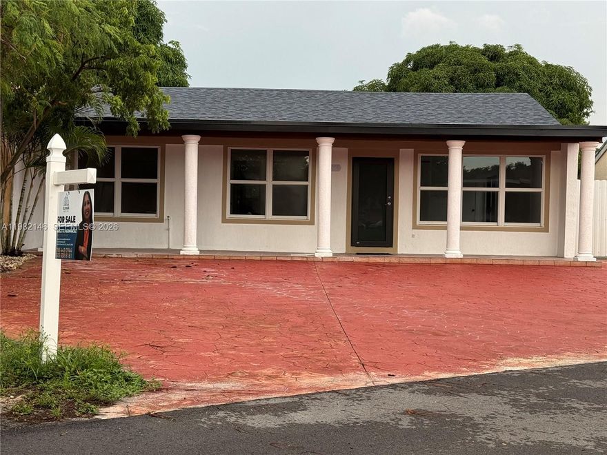 Beautiful 4-bedroom, 2-bathroom home, completely remodeled with a new roof, impact windows, and all new appliances including a washer and dryer. Easy to view on lockbox. Thank you for showing it.