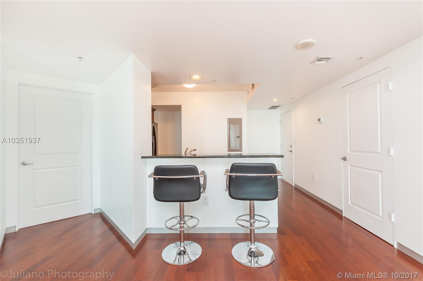 ESPLANADE ON THE NEW RIVE - Residential Lease