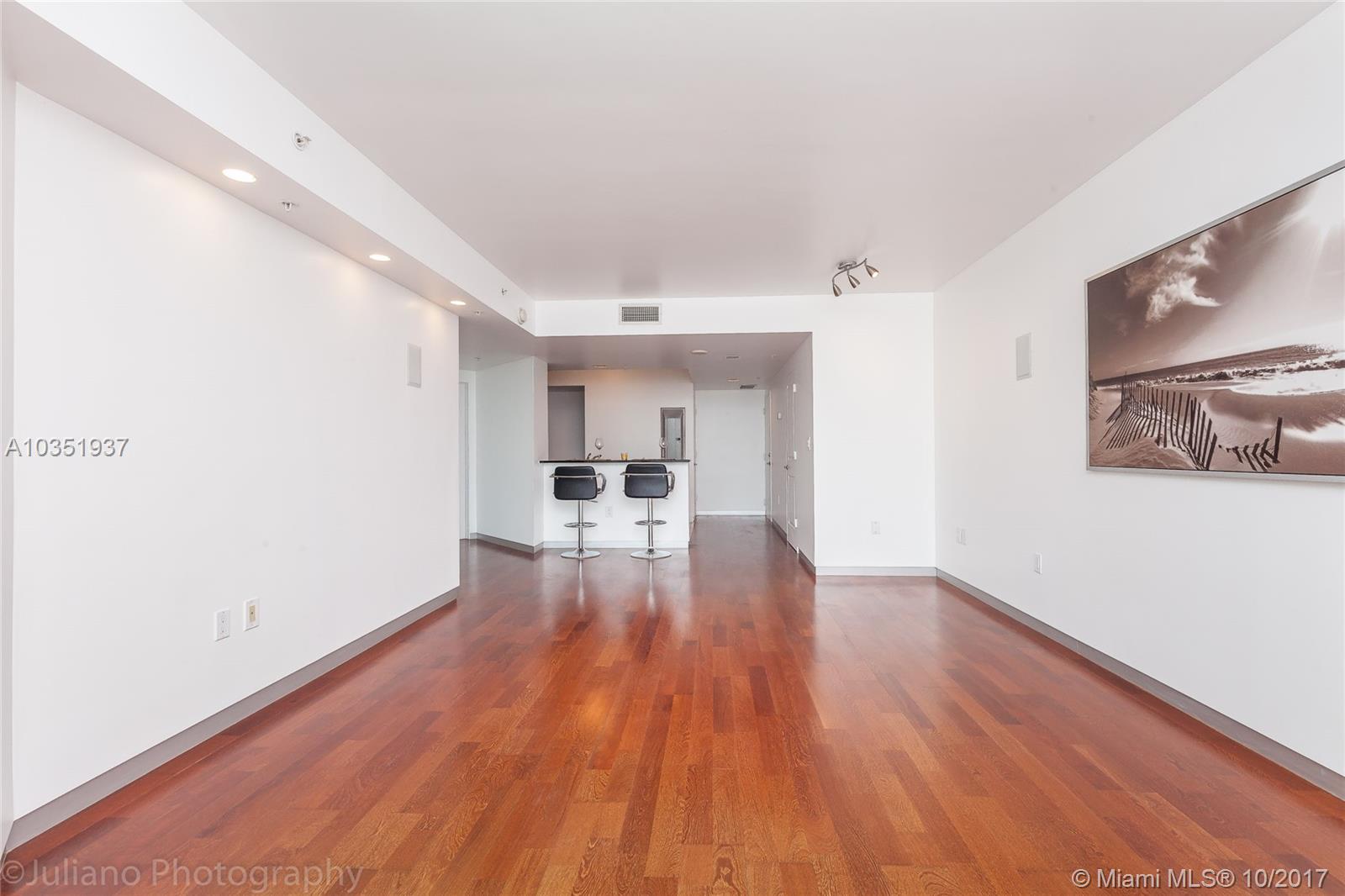 ESPLANADE ON THE NEW RIVE - Residential Lease